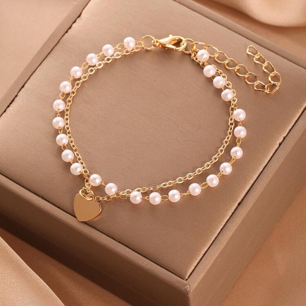 Gold and White Heart Charm Bracelet